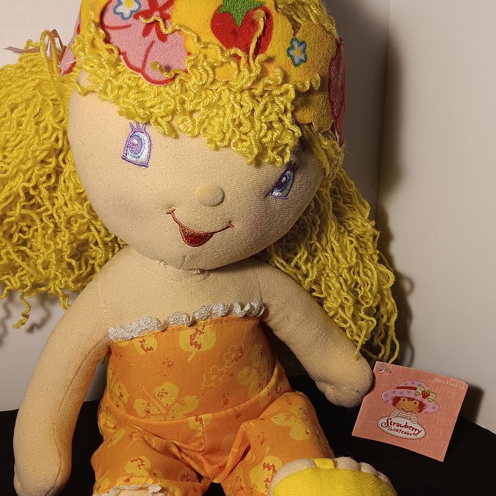 Kellytoy Yellow and Orange Doll with Strawberry Design